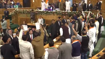 jk assembly session  विशेष दर्जे के प्रस्ताव पर हंगामा  विधायक शेख खुर्शीद को मार्शलों ने खदेड़ा